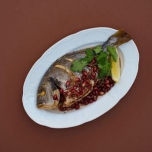 Dorado with pomegranate sauce