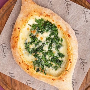 Boat with spinach and herbs