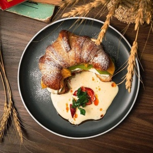 Croissant with cream cheese and fruit in vanilla cream