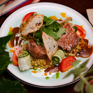 Marbled beef medallions with ptitim pasta in creamy sauce