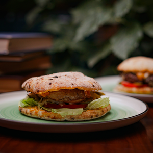 Burger with chicken breast, cheddar cheese and spice sauce