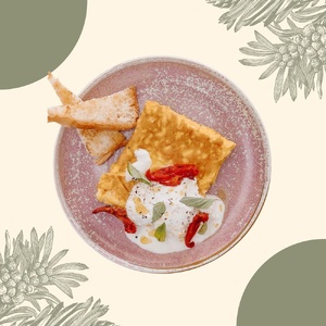 Omelet with stracciatella cheese and sun-dried tomatoes