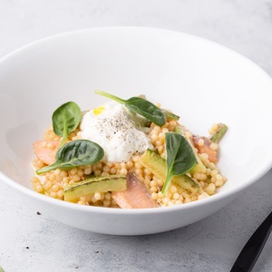 Fregola with smoked salmon and stracciatella cheese