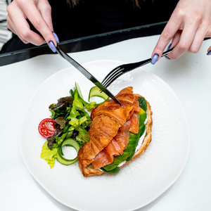 Croissant with salmon and avocado