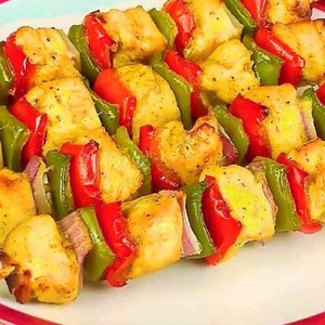 Chicken skewers with vegetables on skewers