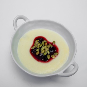  Semolina porridge with cherries and pumpkin seeds