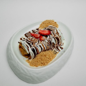 Pancakes XL with banana, strawberry and three chocolates