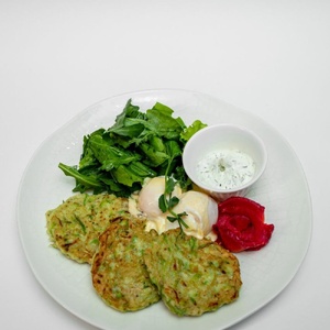 Zucchini pancakes with poached egg and salmon