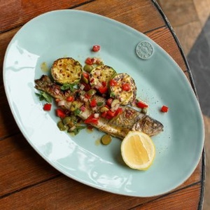 Trout with zucchini on coals