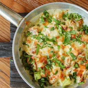 Rabbit stew with sour cream and vegetables