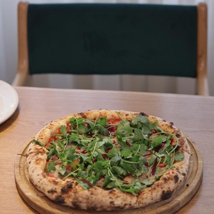 Pizza with lamb and cilantro