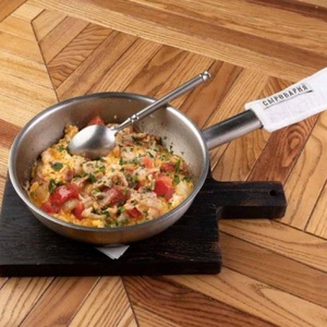 Omelet with beef bacon, tomatoes and onions