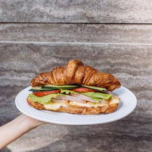 Croissant with omelette and ham