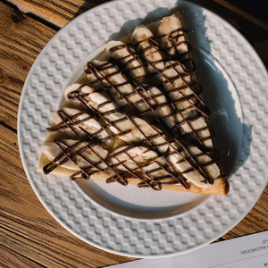 Pancakes with chocolate and banana