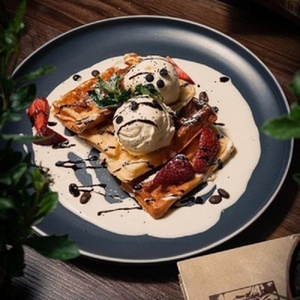 Cottage cheese Belgian waffles with ice cream mousse, berries and chia seeds