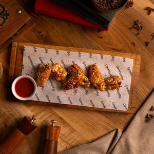 Grilled wings with sweet and sour sauce